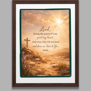 May include: Framed print featuring a scenic landscape with a cross on a rocky hill under a bright sun. The text reads "Lord, during this season of Lent, quiet my heart, strip away what I do not need, and draw me closer to You. Amen."