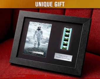 INTERSTELLAR (2014) Cellule di pellicola da 35 mm certificate in una cornice retroilluminata a LED / Autentici cimeli cinematografici / Edizione limitata / Regalo unico e raro