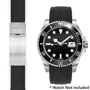 May include: A black watch with a silver bezel and a black rubber strap. The watch face is black with white markings and a date display. The text "Watch Not Included" is at the bottom.