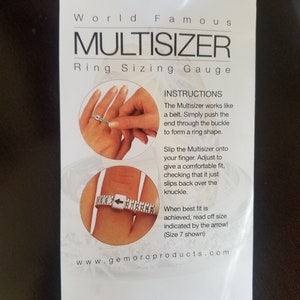 May include: White plastic ring sizer tool with a measuring tape and a buckle. The tool is shown on a finger and the instructions for using the tool are printed on the back of the packaging. The text on the packaging reads "World Famous Multisizer Ring Sizing Gauge".