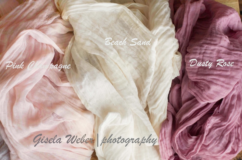 May include: Three fabric swatches in different colors: pink champagne, beach sand, and dusty rose. The fabric is sheer and has a crinkled texture. The text "Gisela Weber | photography" is visible in the bottom center of the image.