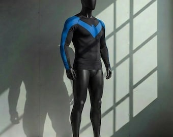 Nightwing inspired black compression with blue design. Coseplay costume