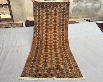 3x6 Ft Warm Terracotta Bokhara Runner Rug, Vintage Afghan Tribal Wool Carpet, Repeating Gul Motifs for Hallway Decor.