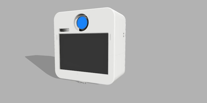 May include: A white, rectangular device with rounded corners, featuring a black screen and a blue circular element on top. The device has a small rectangular opening and is set against a gray background.