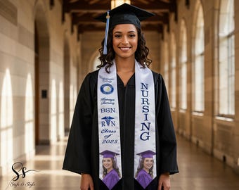 May include: A black graduation gown and cap with a light blue tassel, worn with a white graduation stole. The stole features the text Nightingale College, Hanaya Fleming, BSN, RN, Class of 2023, and Nursing, along with a photo of a graduate.