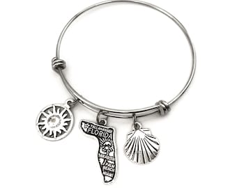 Florida theme bracelet. Includes State of Florida, a Sun for the Sunshine State, and seashell. Perfect Floridian gift. I love Florida Bangle