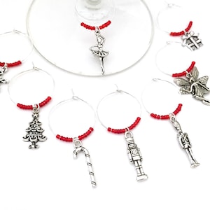 Nutcracker Ballet wine charms. Set of 4 to Set of 8. Includes Ballerina, Soldier, Sugarplum Fairy, Nutcracker, Tree.