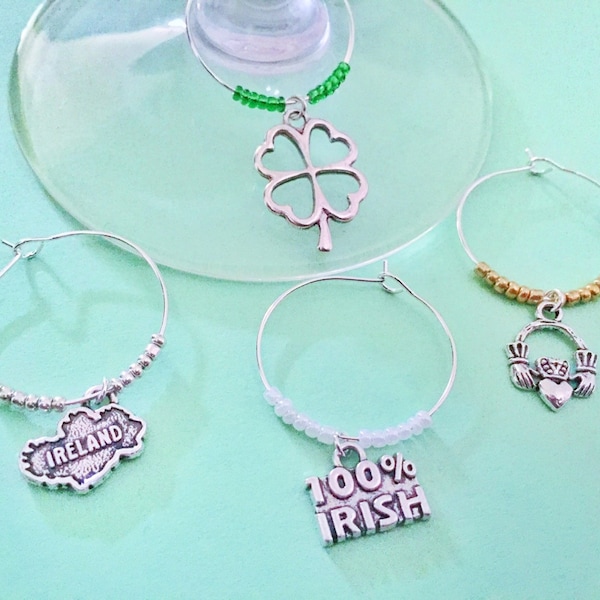 Ireland themed Wine Charms.  Includes Shamrock, Ireland, 100% Irish, and Claddagh Irish Hands holding a heart  Set of 4. St. Patricks Day.