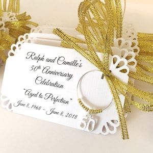 1 to 50 Quantity &quot;Fifty&quot; Personalized Wine charms. Perfect for 50th birthday favors, 50th anniversary favors, etc Customized for your event.