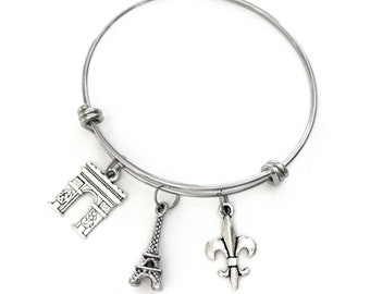 Paris France themed bracelet. Includes Eiffel Tower, Arc de Triomphe, and Fleur de Lis. Gift for French lover.