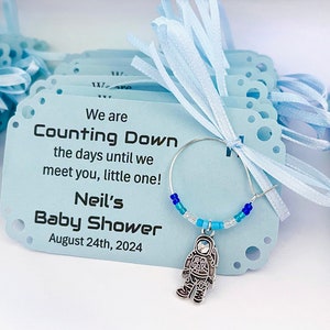 Astronaut charm on wine ring with baby shower favor