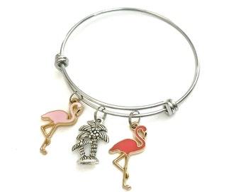 Flamingo themed bracelet. Gift for Flamingo Lovers. Includes Palm Tree and Two Flamingo Charms.