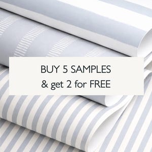 May include: Close-up of several rolls of light blue and white striped wallpaper. The text "BUY 5 SAMPLES & get 2 for FREE" is displayed on a white rectangular background.