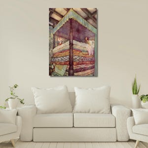 May include: A framed print of a fairytale illustration showing a bed with many mattresses. A woman is in the bed under a canopy. The artwork has a vintage aesthetic, with soft colours and detailed textures, evoking a classic storybook feel.