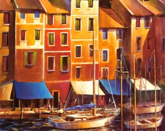 Op de afbeelding: Een schilderij van kleurrijke huizen die een waterkant belijnen met zeilboten die ervoor aangemeerd liggen. De huizen zijn geschilderd in tinten geel, oranje, rood en bruin. De zeilboten zijn wit met blauwe zeilen. Het water is diepblauw.