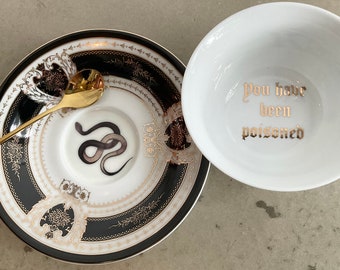 Porcelain "You have been poisoned" Snake cup and saucer set, Porcelain