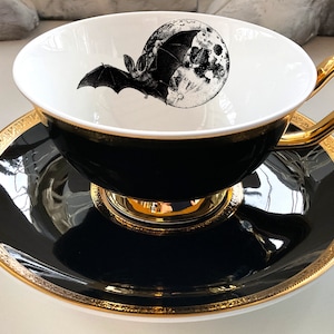 Beautiful Bat and Moon Teacup and Saucer Set, 8 Ounces, Food Safe and Durable, Porcelain.