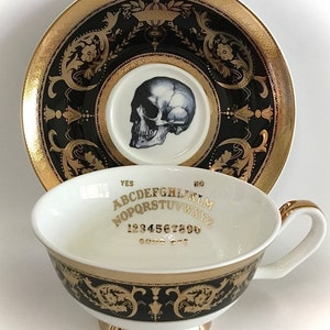 Black and Gold Ouija Board and Skull Teacup and Saucer Set, 7 oz