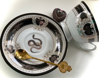 Porcelain Snake cup and saucer set or Plate. Food Safe and Durable, Porcelain. Holds 8 ounces.