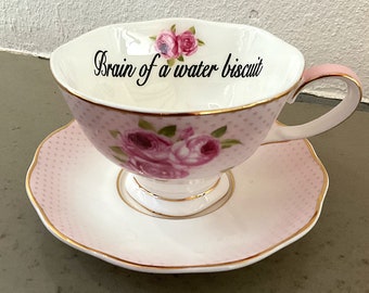 Floral Rude Teacup and Saucer Set with Spoon, 7 ounces. Porcelain.