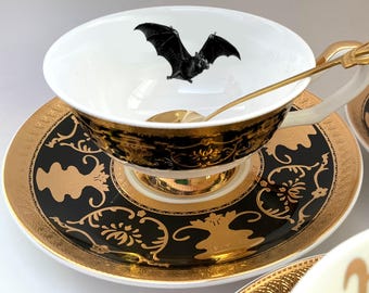 Black and Gold Bat Teacup and Saucer Set (7 Ounces). Food Safe and Durable.