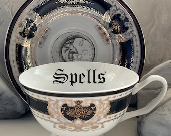 ENVÍO GRATIS - Hermosa taza de té y platillo (22 onzas) o plato "Hechizos bajo la Luna" en oro de 22 quilates y negro. Apto para alimentos y duradero. Porcelana.
