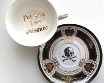 Porcelain &quot;You have been poisoned&quot; cup and saucer set. 22k gold, food safe.