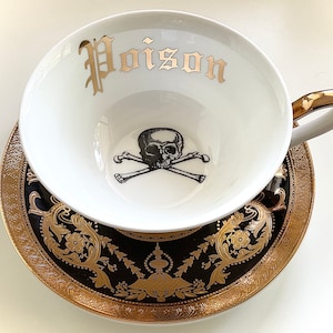 Gorgeous 22k Gold and Black "Poison" Teacup & Saucer Set, 7 Ounces
