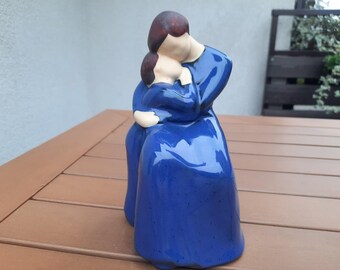 Jie Gantofta figurine of mother and a child huging made by Ewa Jarenskog, Sweden.