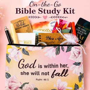 May include: An "On-the-Go Bible Study Kit" with a floral design. The kit includes a pencil case with the text "God is within her, she will not fall" and Psalm 46:5. Inside are study materials, pens, and cards.