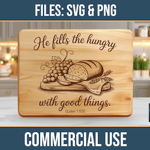 May include: Wooden cutting board with engraved text and illustrations. The text reads "He fills the hungry with good things" with a reference to Luke 1:53. The design includes a loaf of bread, grapes, and wheat. The words "FILES: SVG & PNG" and "COMMERCIAL USE" are also visible.