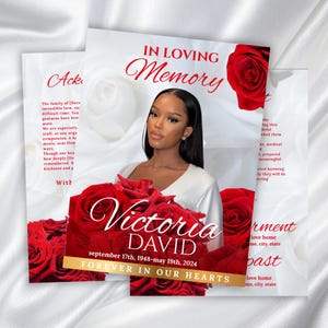 Może przedstawiać: Karta pamiątkowa z portretem kobiety, otoczona czerwonymi różami. Karta zawiera napis "In Loving Memory" oraz imię i nazwisko "Victoria David" z datami urodzenia i śmierci. Widnieje również fraza "Forever in Our Hearts".