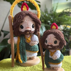 May include: A set of three ceramic mugs with a speckled, matte finish. The mugs are in shades of cream, light gray, and dark gray. Each mug has a simple, minimalist design and a rounded handle.