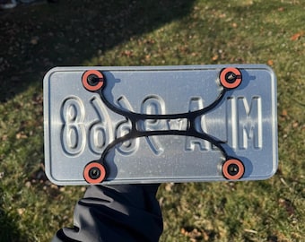 License Plate Riser - Floating Plate Protects Paint & Quiets Rattles