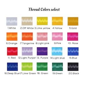 Op de afbeelding: Een kleurenkaart met de titel Thread Colors select met twintig genummerde stalen borduurgaren. De kleuren zijn wit, gebroken wit, limoengeel, geel, goud, oranje, mandarijn, lichtroze, roze, roze, rood, lichtpaars, paars, lichtblauw, blauw, donkerblauw, limoengroen, groen en zwart.