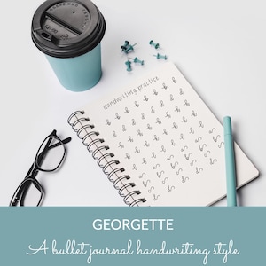 May include: A notebook with handwriting practice, a pen, and a coffee cup. The notebook has a spiral binding and the words "Handwriting practice" at the top. The text "GEORGETTE" and "A bullet journal handwriting style" are at the bottom.