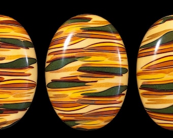 set of 9 30x40mm cabochons (appears to be plaster)