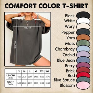 May include: A dark gray Comfort Color T-shirt with measurements in inches. The image displays a color chart with options like black, white, and red. The shirt's length ranges from 18.25 to 27.75 inches, and the width from 26.62 to 32.50 inches.