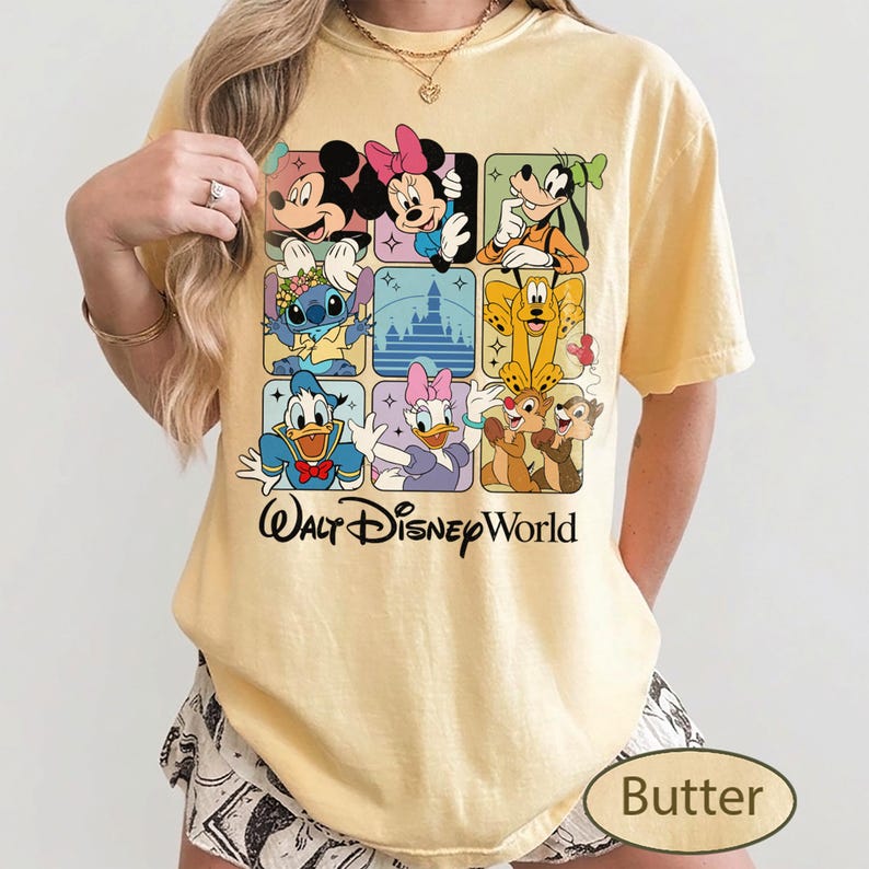 May include: Butter-colored t-shirt featuring a grid of Disney characters including Mickey Mouse, Minnie Mouse, Goofy, Stitch, Pluto, Donald Duck, Daisy Duck, Chip, and Dale. The words "Walt Disney World" are printed below the grid.