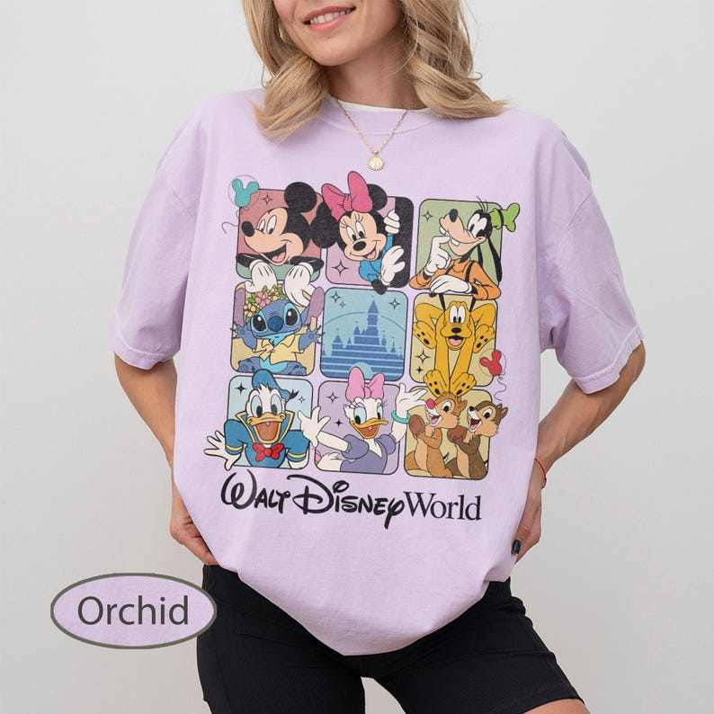 May include: Orchid-colored t-shirt featuring a grid of Disney characters including Mickey Mouse, Minnie Mouse, Goofy, Stitch, Donald Duck, Daisy Duck, and Chip and Dale. The words "Walt Disney World" are printed below the grid.