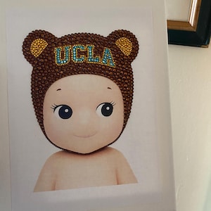 custom bedazzled sonny angel wall art