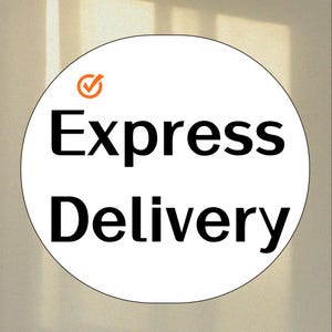 May include: A white circular sticker with the words "Express Delivery" in bold black font. An orange checkmark icon is above the word "Express". The sticker is against a neutral background.