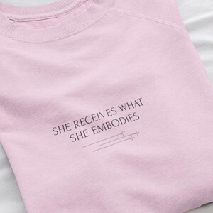 She Receives What She Embodies Crewneck Sweatshirt | Minimal Script Inspirational