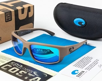 Gafas de sol polarizadas estilo cola de abanico Costa Del Mar, color marrón/azul.