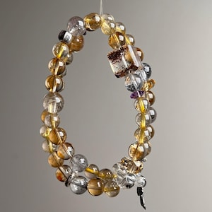 Bracelet de guérison en cristal jaune tour : cinq éléments de richesse et de protection