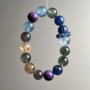 Bracelet de guérison en cristal cheveux verts : richesse des cinq éléments