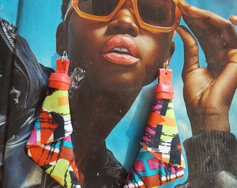 Multicolored fabric, leather based geometric hand manipulated designed earrings.
