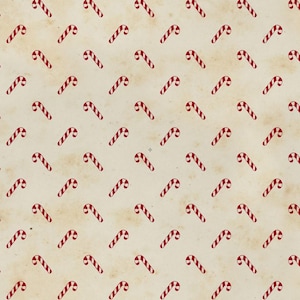 May include: A repeating pattern of small red and white striped candy canes arranged in diagonal rows across a light beige background with a subtle, aged, and weathered texture throughout the entire surface of the material.