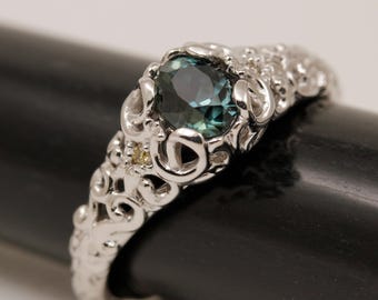 Green Sapphire Ring: 0.85 Carat Oval, Filigree 14k White Gold, natural sapphire.