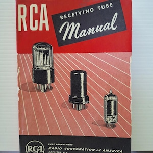 May include: Vintage RCA Receiving Tube Manual with a red and black cover. The cover features the RCA logo, the title "Manual", and illustrations of vacuum tubes. The manual is from the Radio Corporation of America.